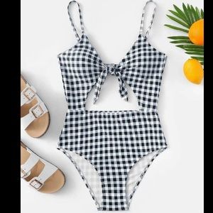 Accidentally purchased 2! Adorable swimsuit.